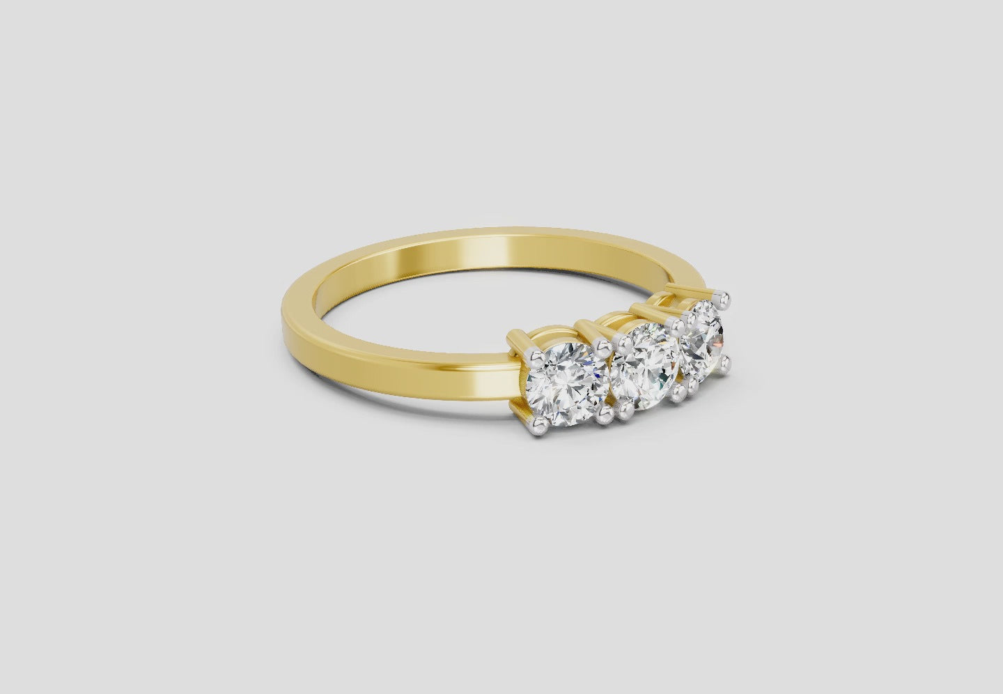 Load video: 0.62 Ct Round Three Stone Ring | 14K Yellow Gold