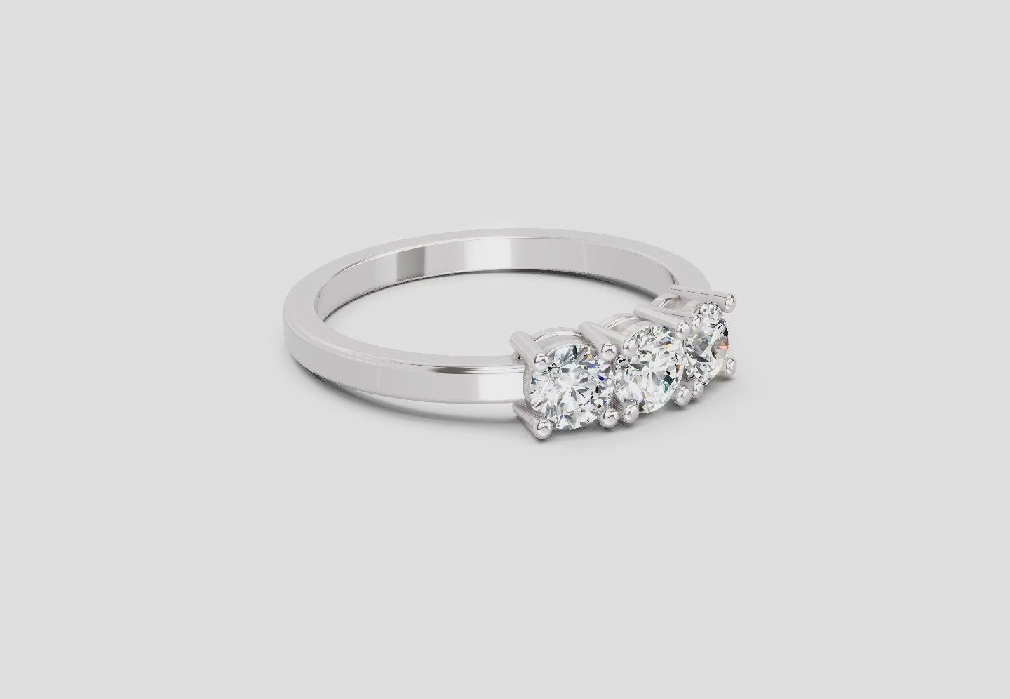 Load video: 0.62 Ct Round Three Stone Ring | 14K White Gold