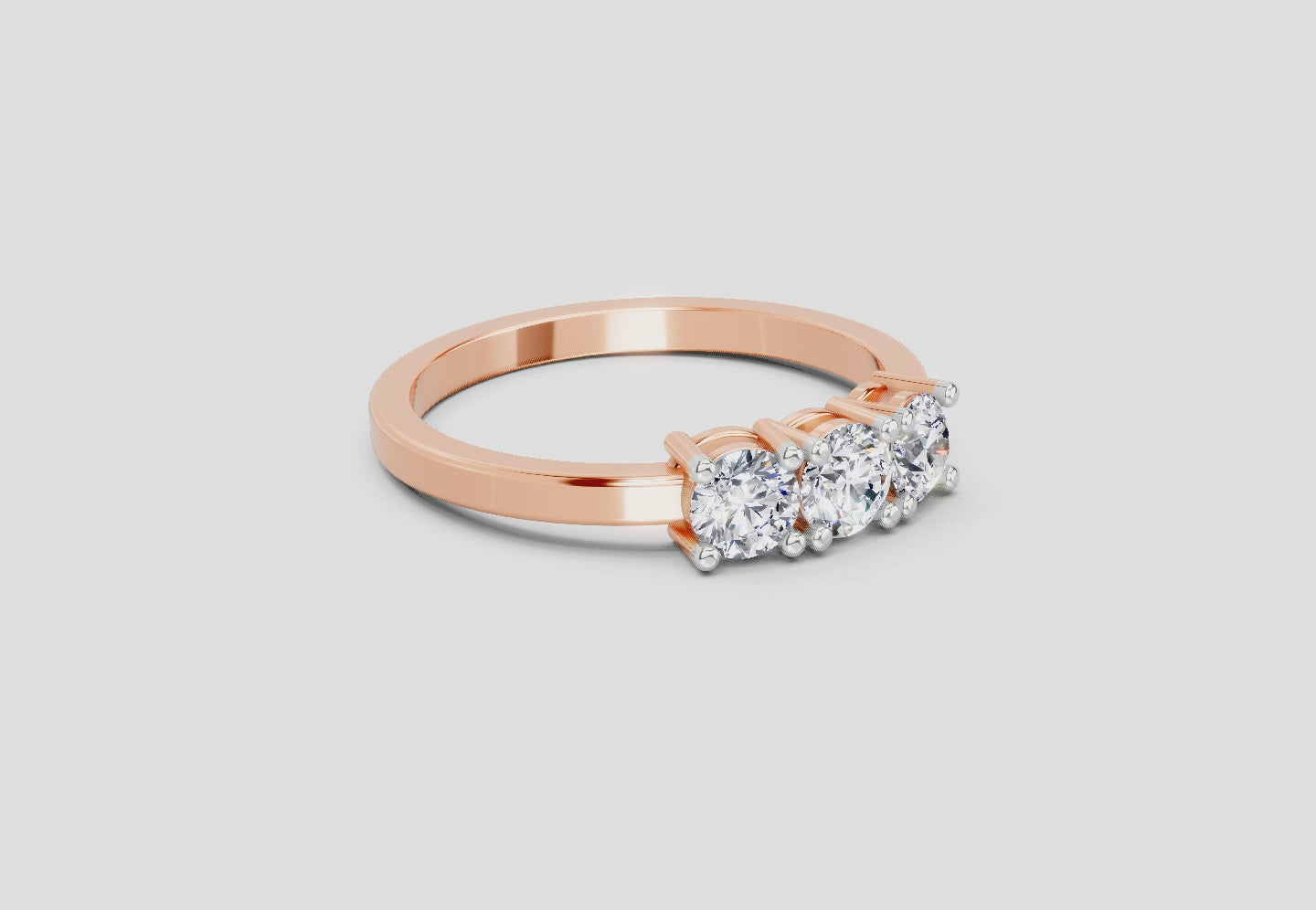 Load video: 0.62 Ct Round Three Stone Ring | 14K Rose Gold