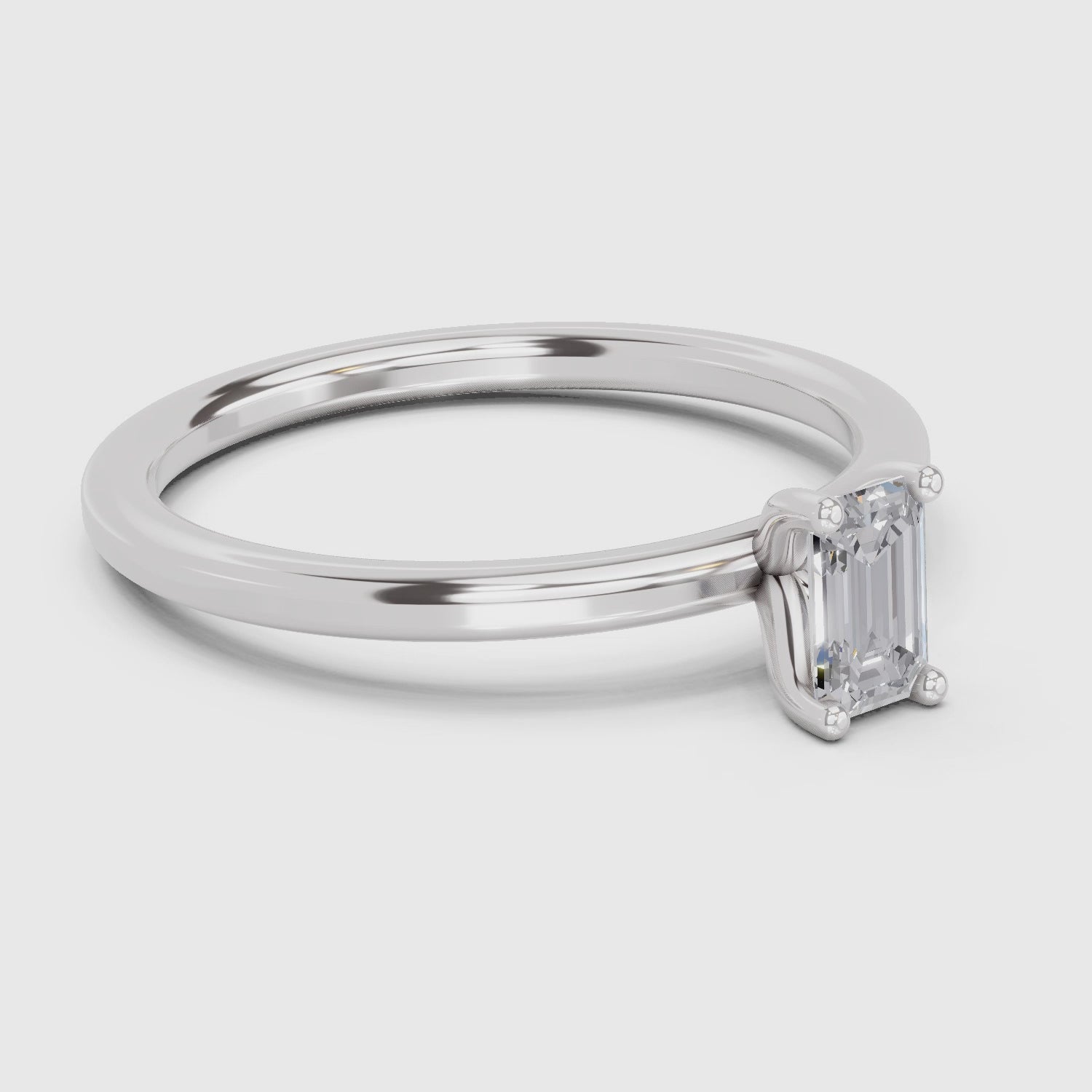 Load video: 0.4 Carat Emerald Shape Solitaire Diamond Engagement Ring | 14K White Gold