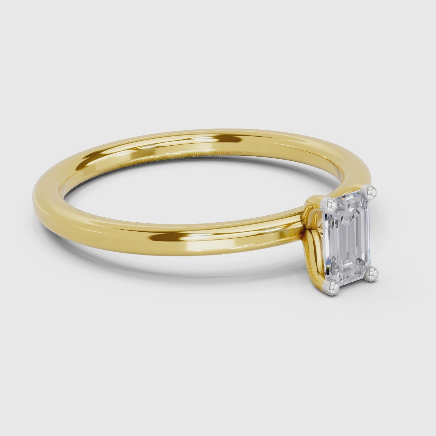 Load video: 0.4 Carat Emerald Shape Solitaire Diamond Engagement Ring | 14K Yellow Gold
